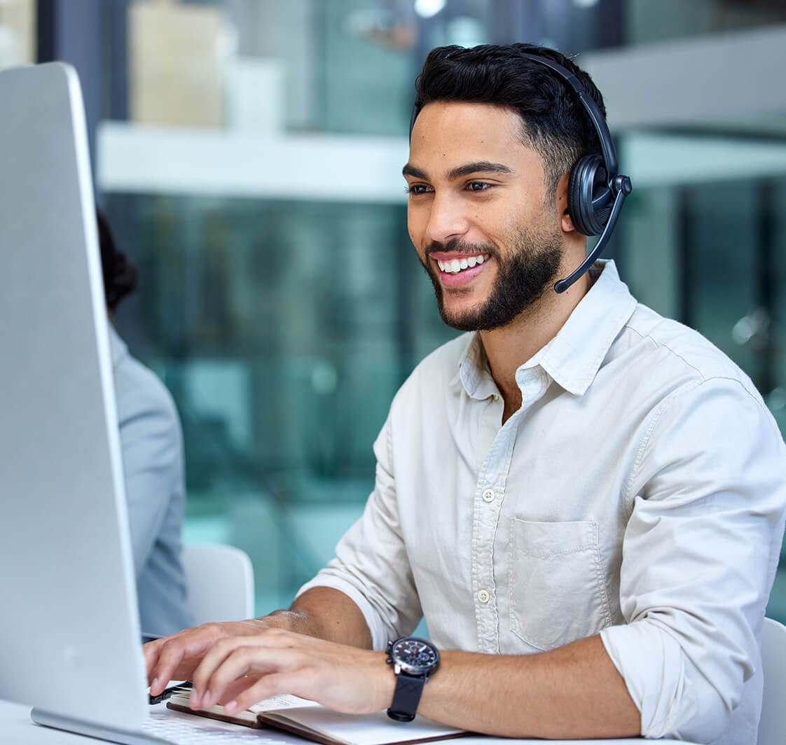 Business man, call center and web support communication at a computer in a office.