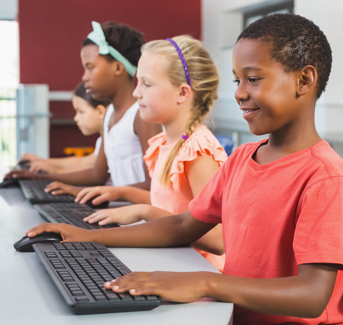 Children using computers in a school.