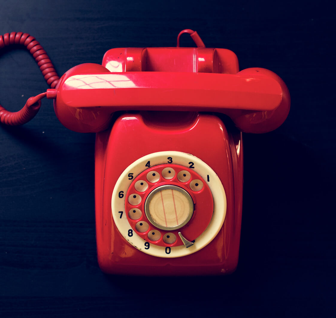 Old ring dial telephone.