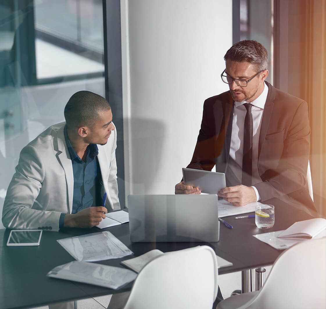 Two men working in a modern office.