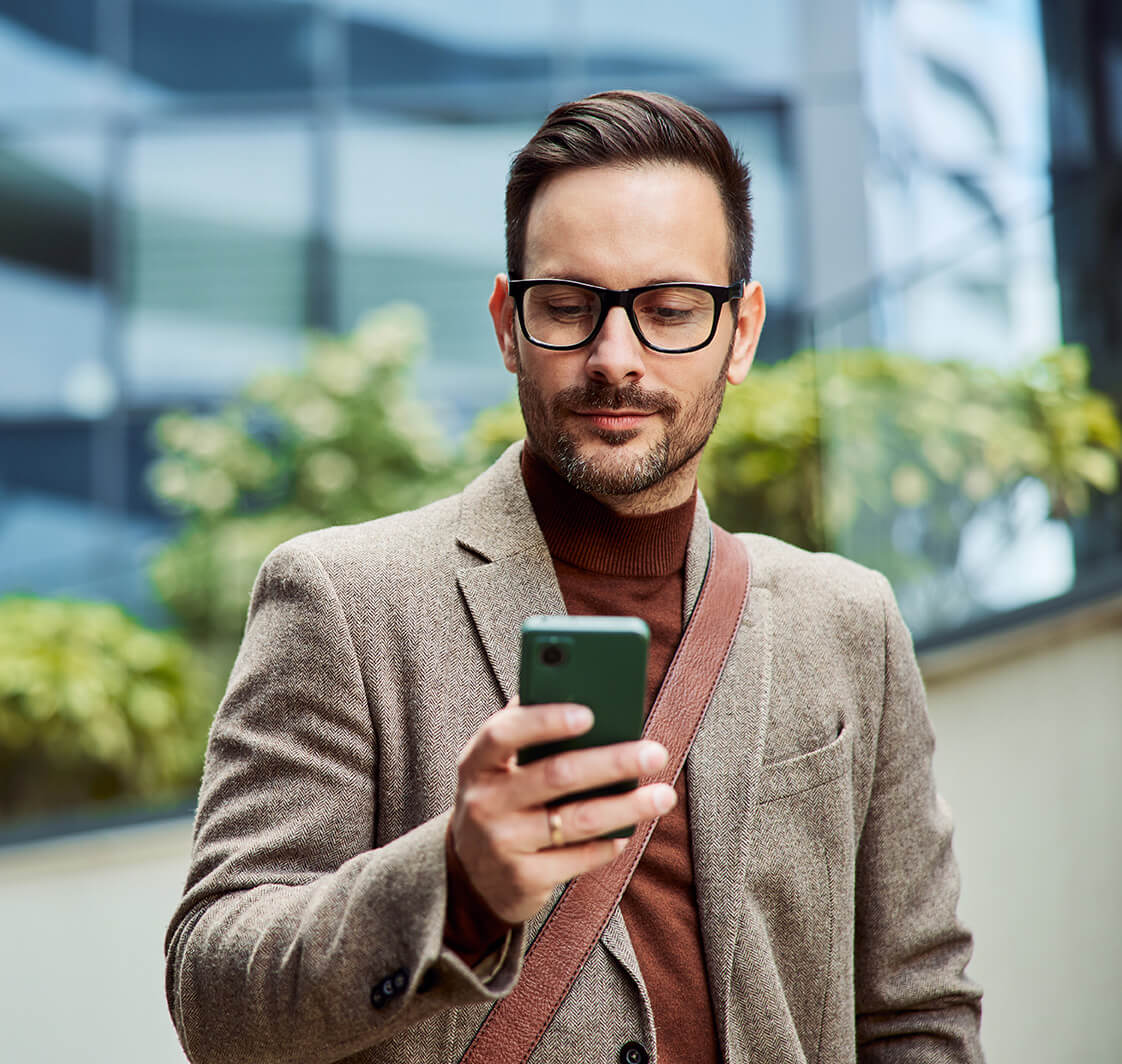 Man using mobile phone.