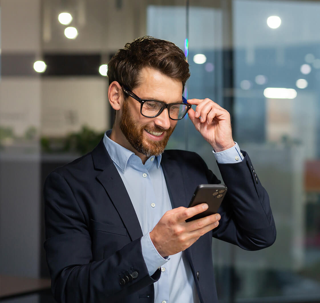 Man using mobile phone.