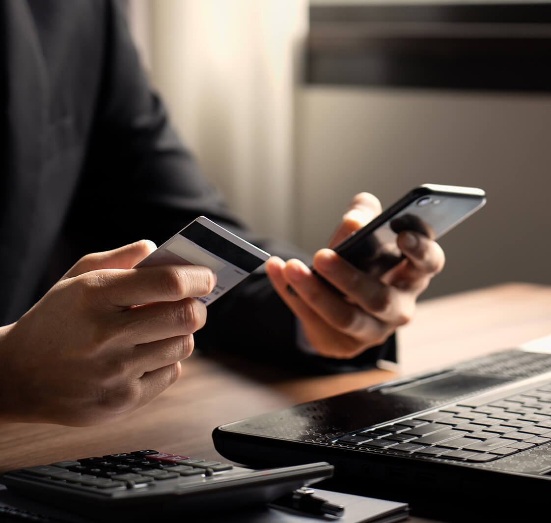 Businessman using credit card, Businessman or entrepreneur working, Online shopping, e-commerce, making transaction using mobile bank application. online payment, secure transactions for e-commerce