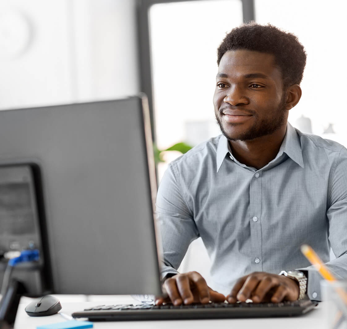 Businessman with computer working at office.