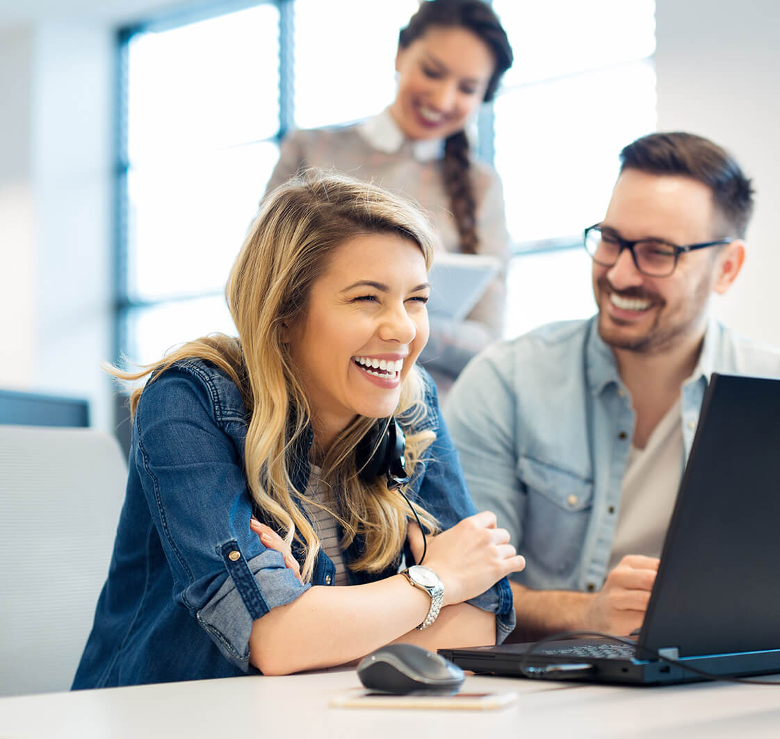 Group of business people and software developers working as a team in office.