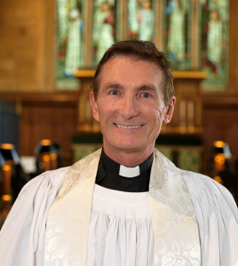 Vicar in a church.
