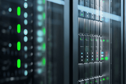 Close up of a server stack with flashing lights