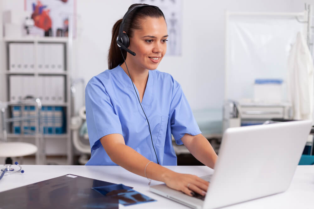 Nurse at a laptop at Conisborough Group Practice