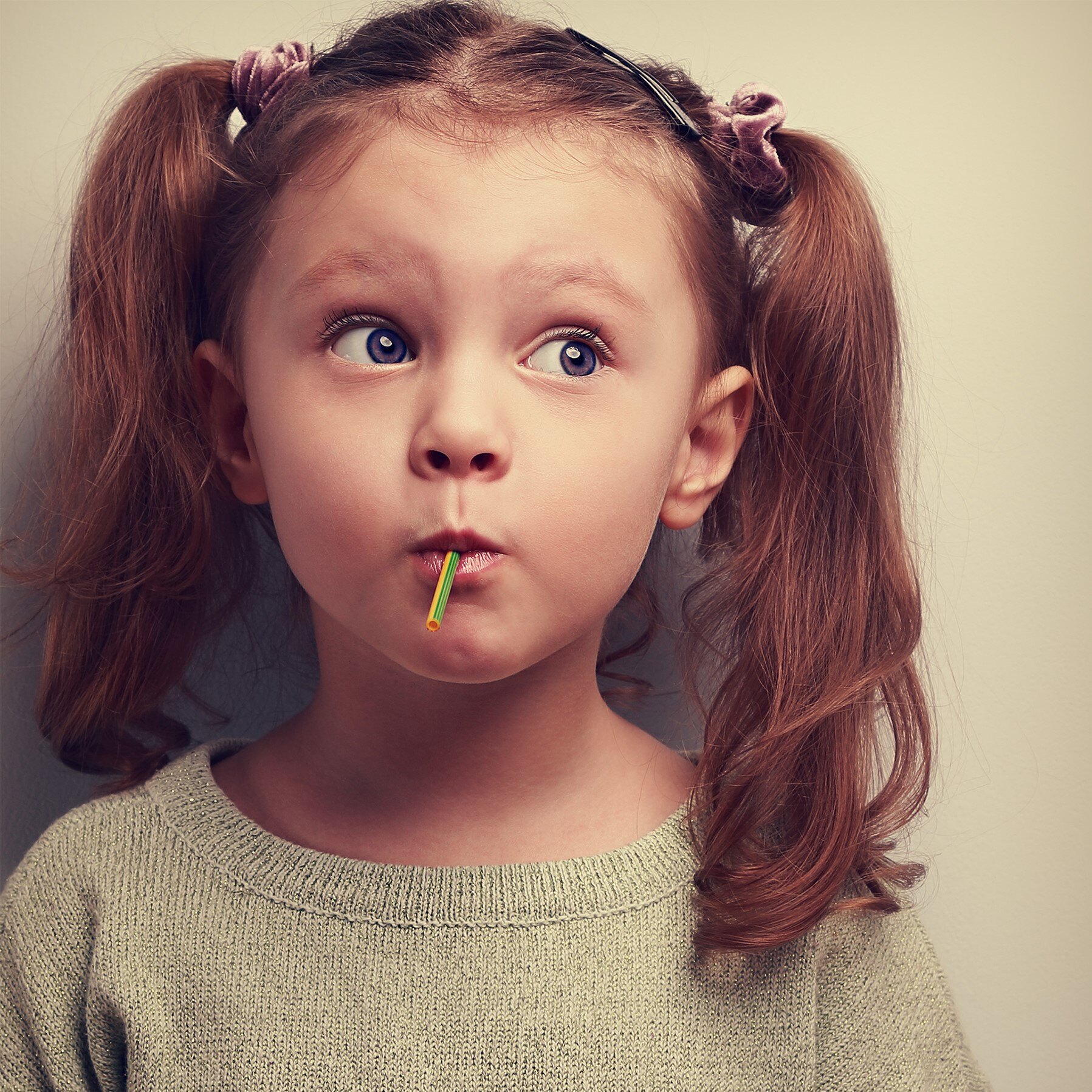 Child with a Swizzels lollipop