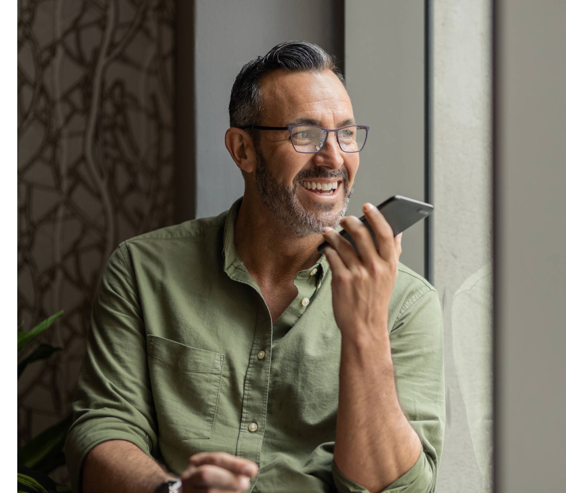 Man speaking into phone