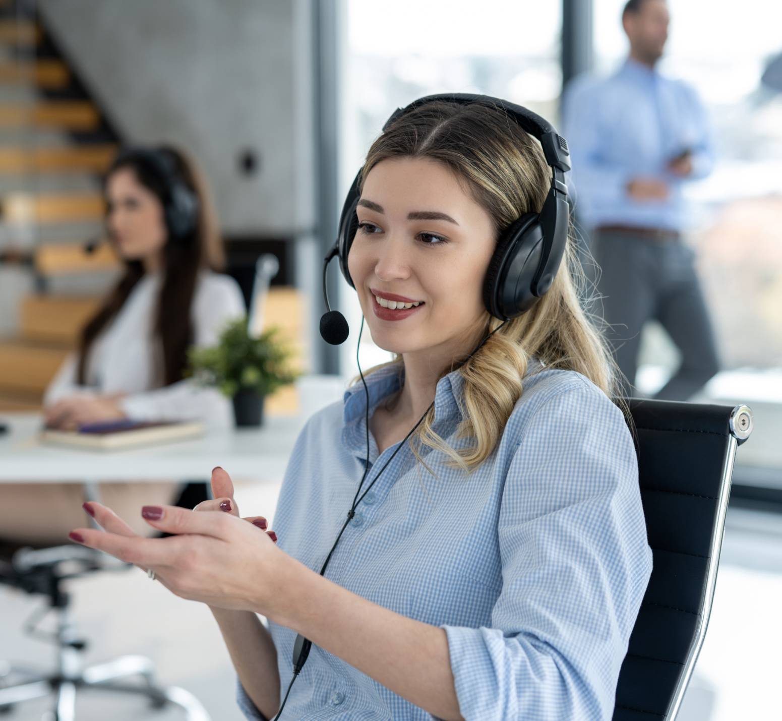 Woman talking to customer